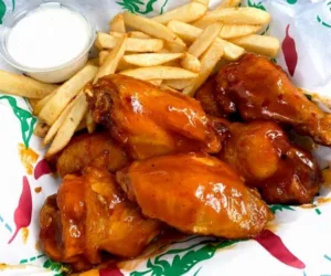 Mango habanero wings with fries and ranch from Hatch Corner Snacks & More in Hatch New Mexico