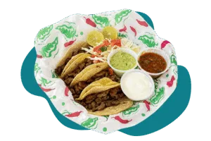Carne asada tacos with lime, guacamole, salsa, and crema from Hatch Corner Snacks & More in Hatch New Mexico